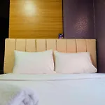 Compact And Comfy 2Br Bassura City Apartment By Travelio