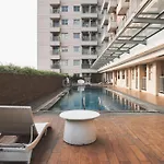 Minimalist And Cozy Living 1Br Belmont Residence Puri Apartment By Travelio