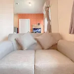 Cozy Living 2Br Green Pramuka City Apartment Near Mall By Travelio