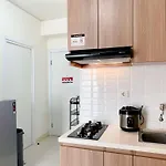 Comfort Designed 2Br Green Pramuka City Apartment By Travelio