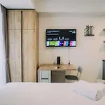 Homey And Warm Studio At West Vista Apartment By Travelio