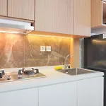 Comfort And Modern Look 2Br At 26Th Floor Samara Suites Apartment By Travelio