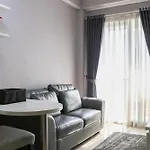 Minimalist And Warm 1Br Signature Park Grande Apartment By Travelio