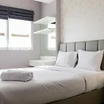Minimalist And Warm 1Br Signature Park Grande Apartment By Travelio