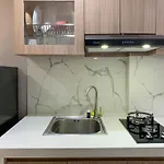 Brand New And Relaxing Studio At Daan Mogot City Apartment By Travelio