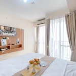 Modern Look And Comfy Studio Tifolia Apartment By Travelio