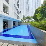 Best Modern 2Br At Bassura City Apartment By Travelio