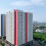 Modern Look And Comfortable 2Br Green Pramuka City Apartment By Travelio
