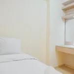 Fully Furnished With Elegant Design 2Br Bassura City Apartment By Travelio