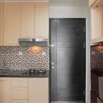 Homey And Warm 1Br Belmont Residence Puri Apartment By Travelio