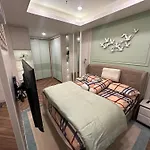 Apartemen Capitol Suites
