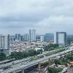 Cozy Stay Studio Signature Park Grande Apartment By Travelio