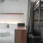 Comfort And Warm Studio Room At West Vista Apartment By Travelio