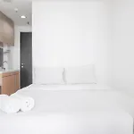 Minimalist And Comfort Studio At Belmont Residence Puri Apartment By Travelio