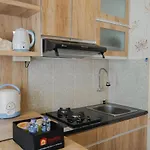 Best Furnished 2Br Mall Access At Green Pramuka Apartment By Travelio