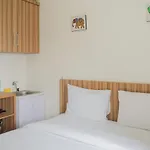 Cozy Studio Green Pramuka Apartment Next To Mall By Travelio
