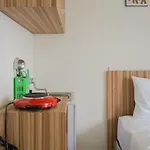 Cozy Studio Green Pramuka Apartment Next To Mall By Travelio