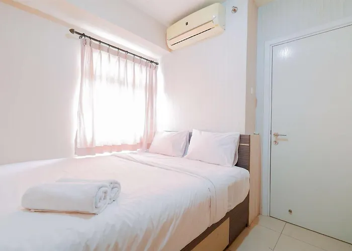 Modern And Homey 2Br At Green Pramuka City Apartment By Travelio