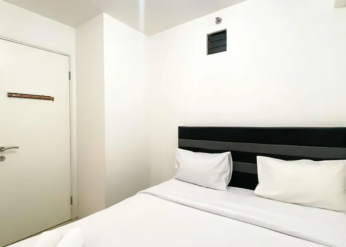 Well Furnished And Homey 2Br Bassura City Apartment By Travelio