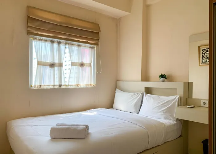 Modern Look And Comfortable 2Br Green Pramuka City Apartment By Travelio