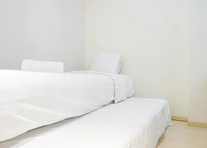 Fully Furnished With Elegant Design 2Br Bassura City Apartment By Travelio