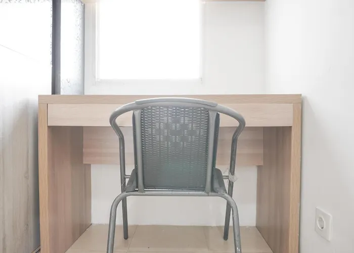 Minimalist And Comfort Studio At Belmont Residence Puri Apartment By Travelio