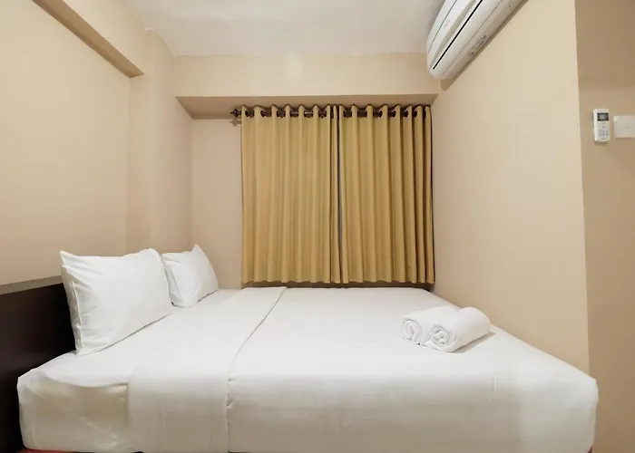 Compact And Comfy 2Br Bassura City Apartment By Travelio