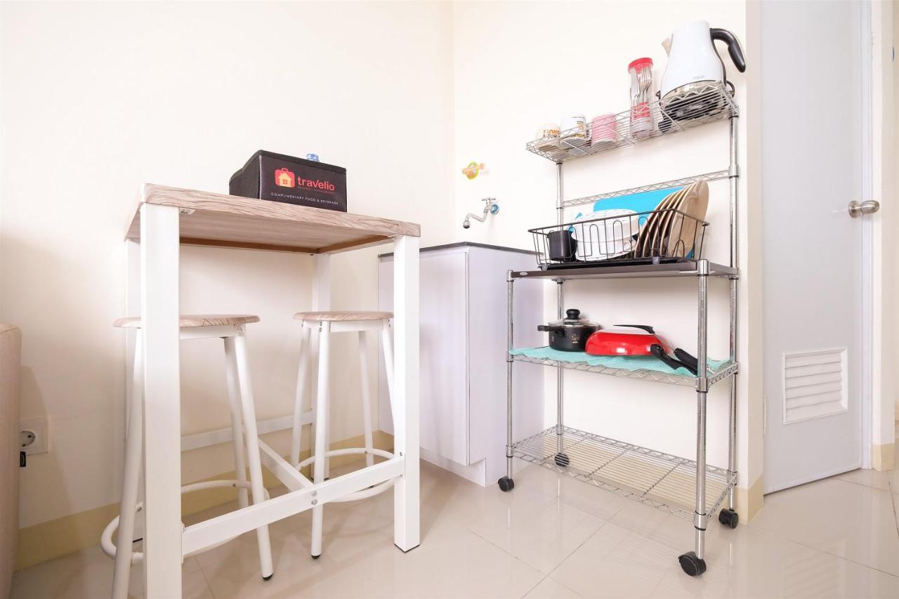 Apartment Cozy 2br At 28th Floor Pramuka By Travelio *