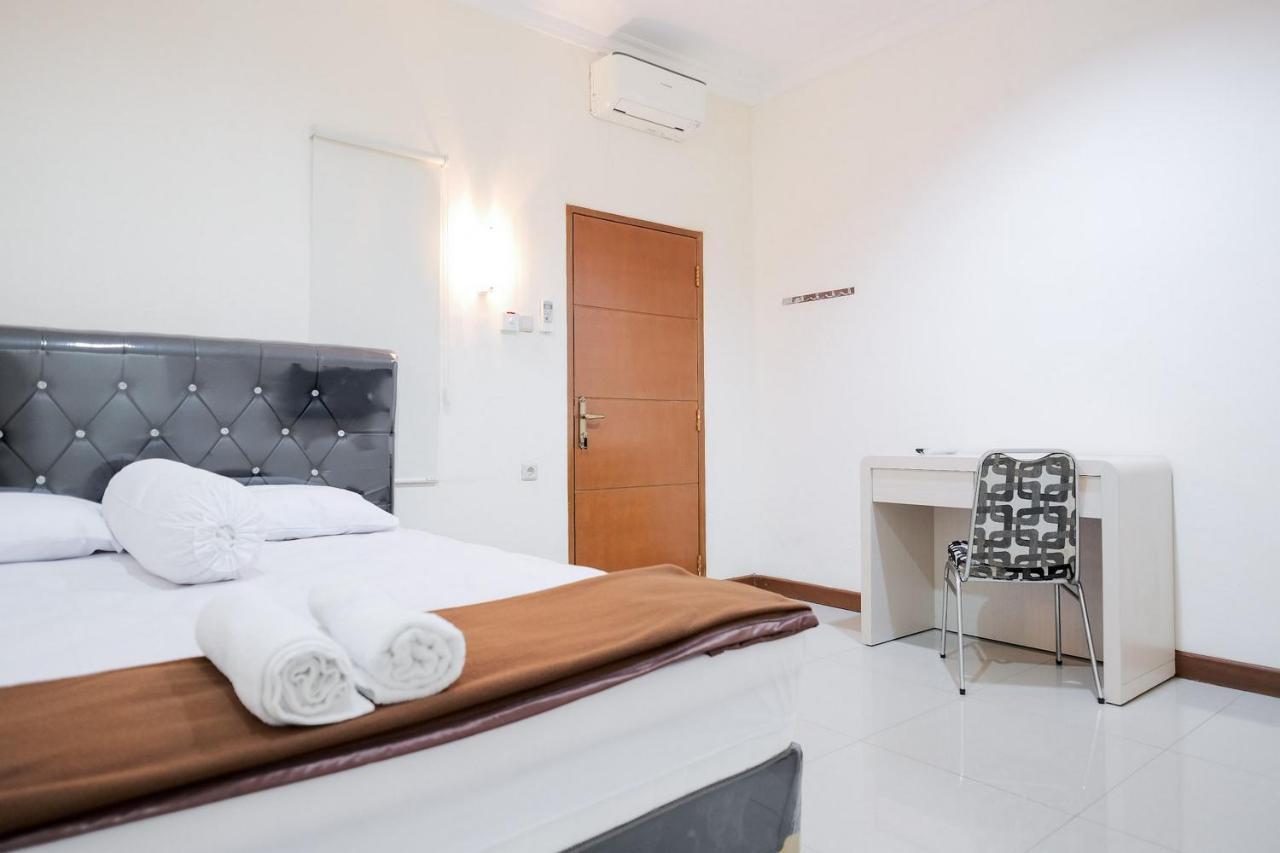 Delapan Mitra Reddoorz