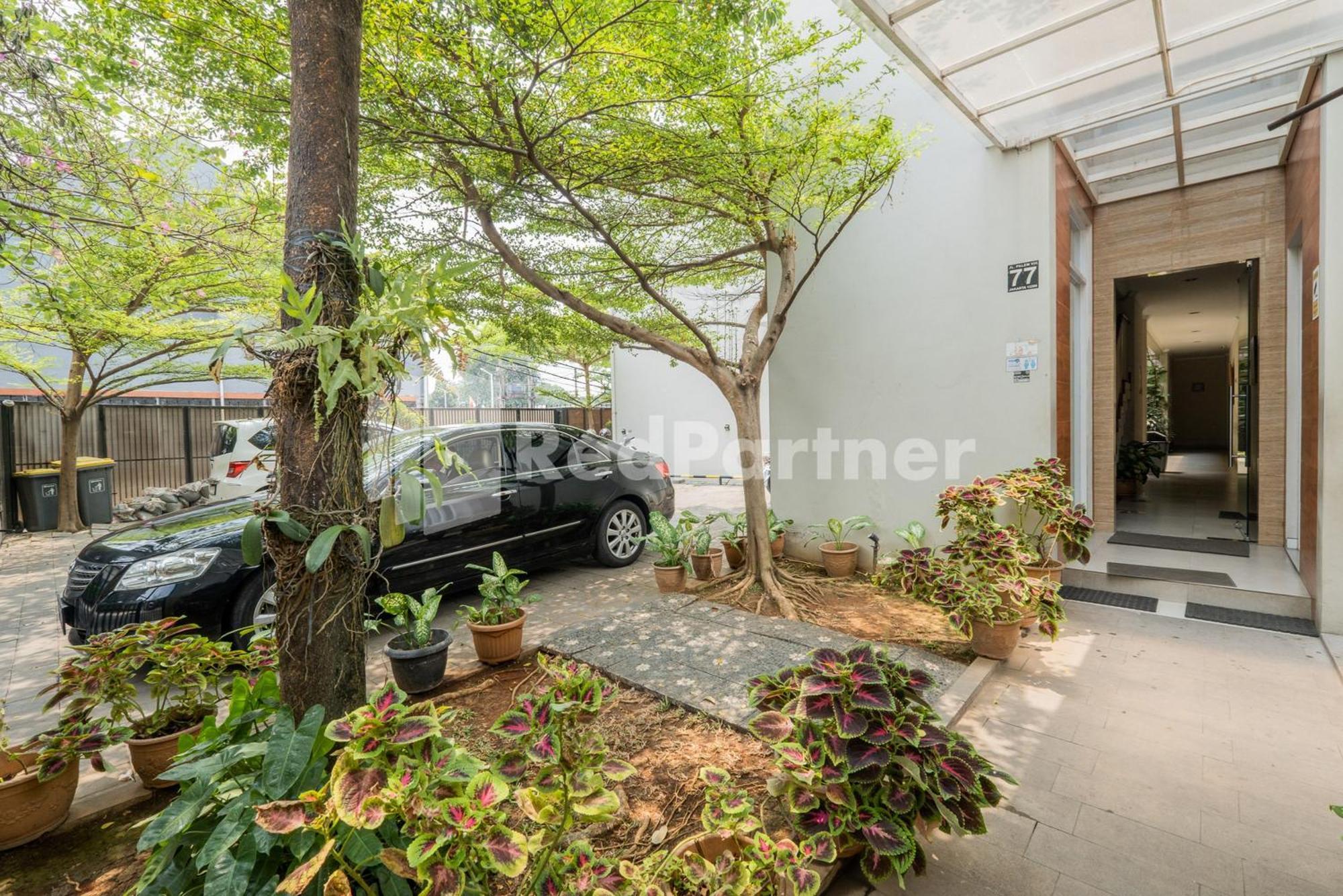 Khách sạn Palm Eight Mitra Reddoorz 3*
