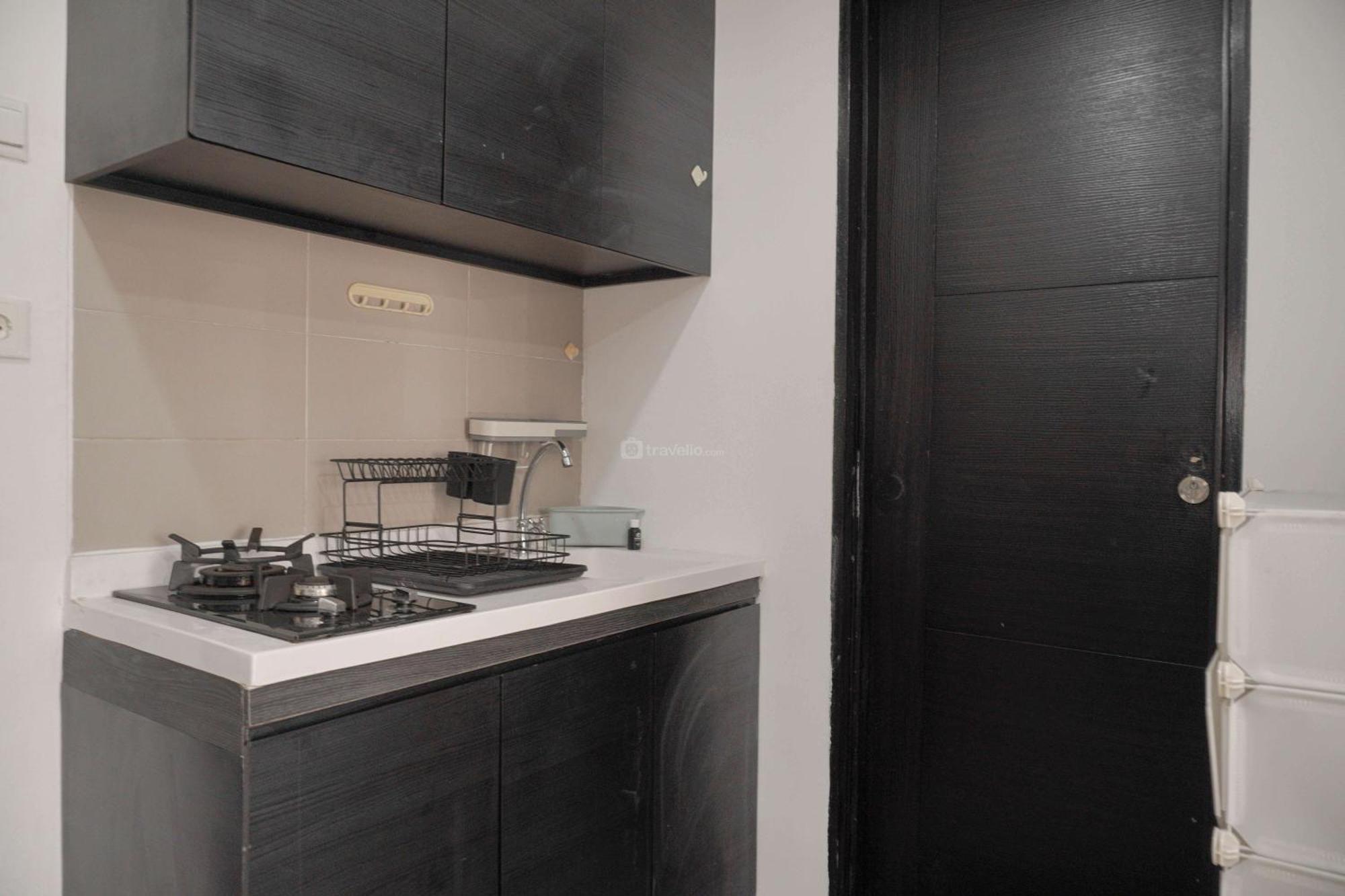 Minimalist And Cozy Living 1br Belmont Puri By Travelio Apartment *