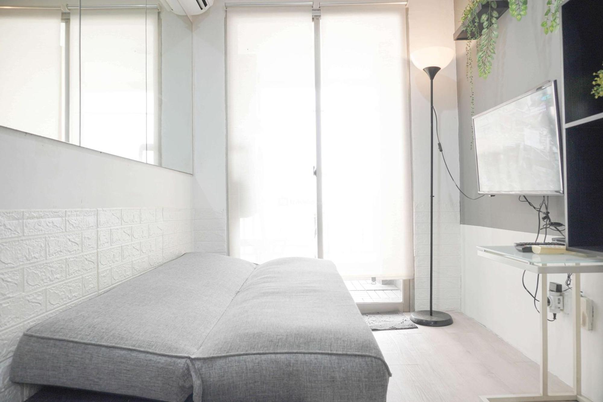 Minimalist And Cozy Living 1br Belmont Puri By Travelio Apartment Jakarta