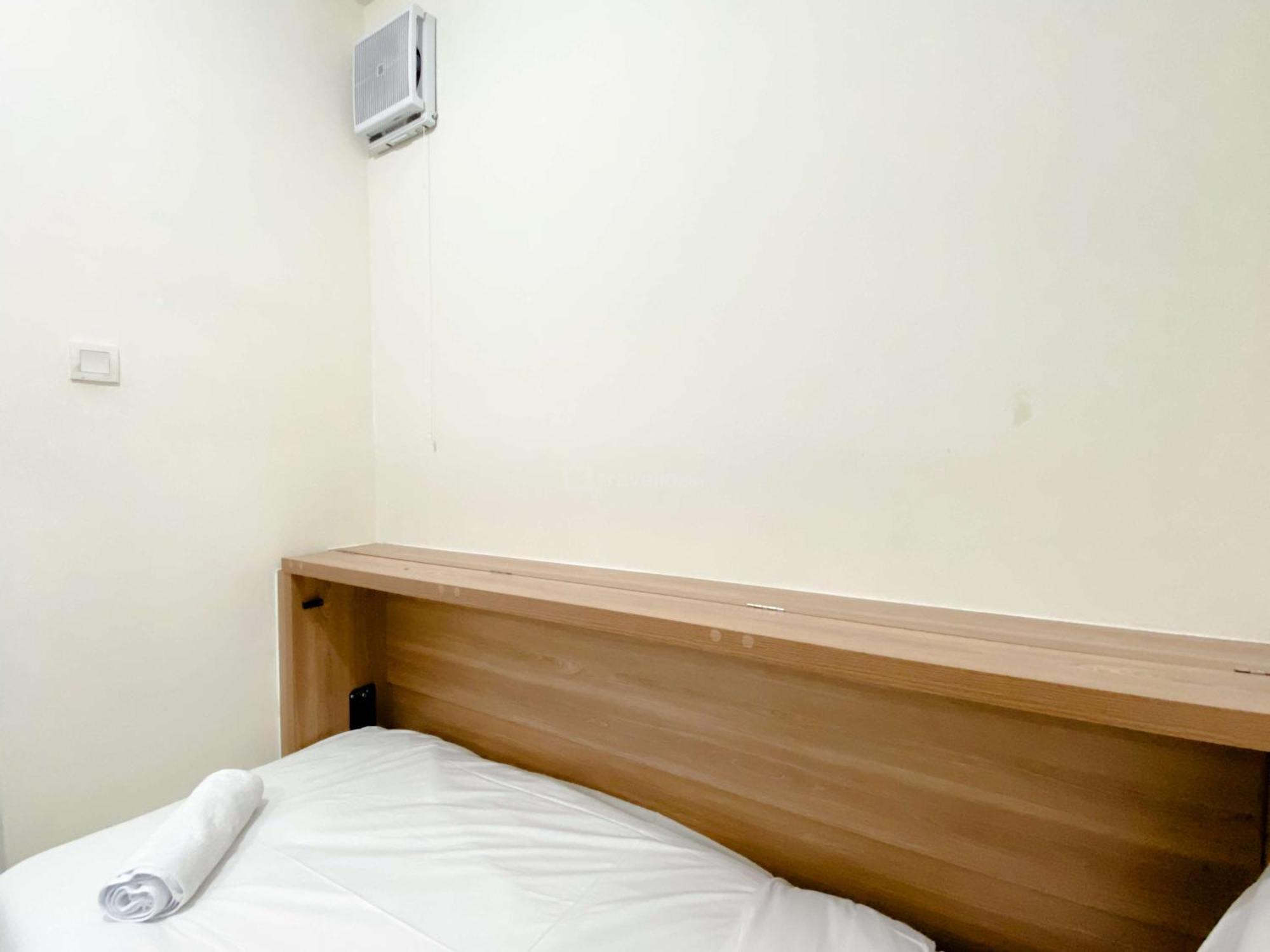 Comfort Designed 2br Pramuka By Travelio Apartment