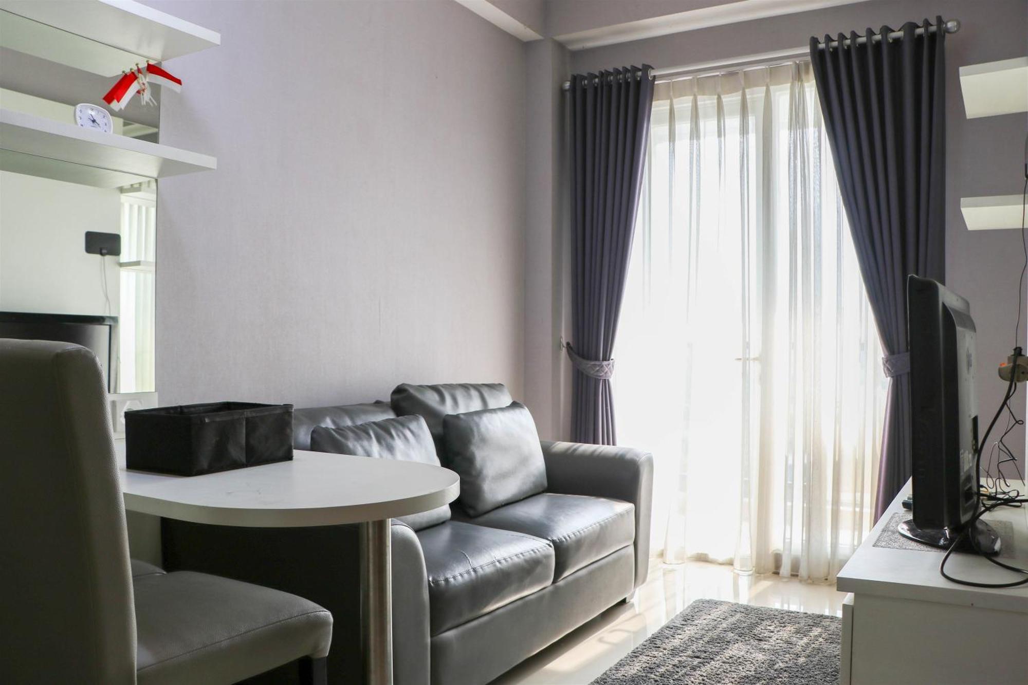 Minimalist And Warm 1br Signature Park Grande By Travelio