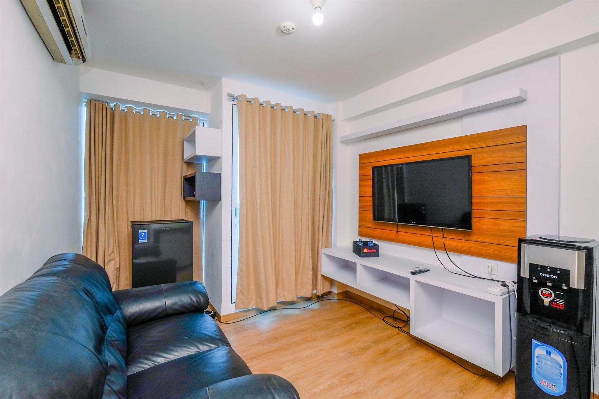 Apartment Comfortable And Warm 2br At Tifolia By Travelio *
