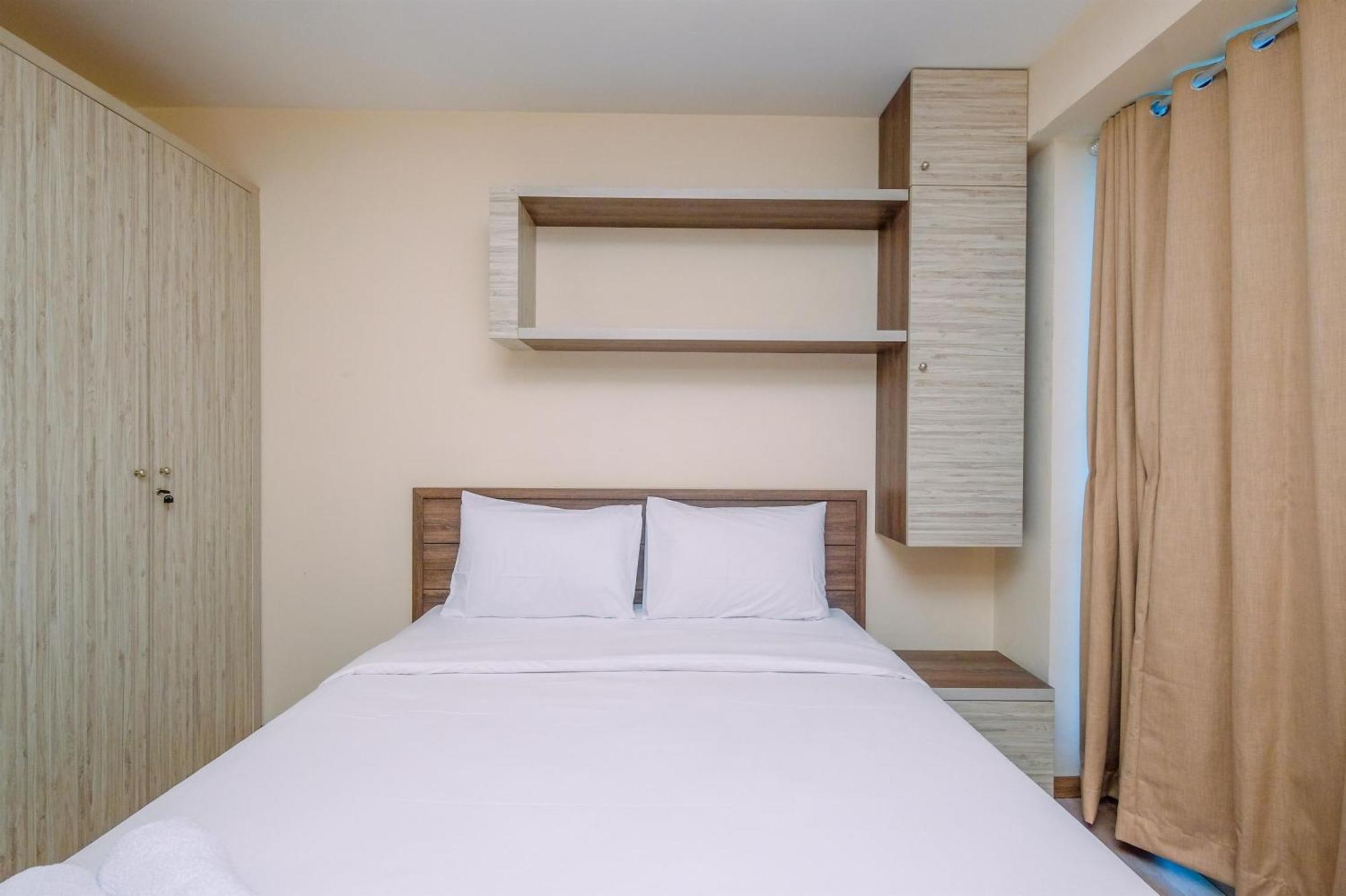 Apartment Comfortable And Warm 2br At Tifolia By Travelio *