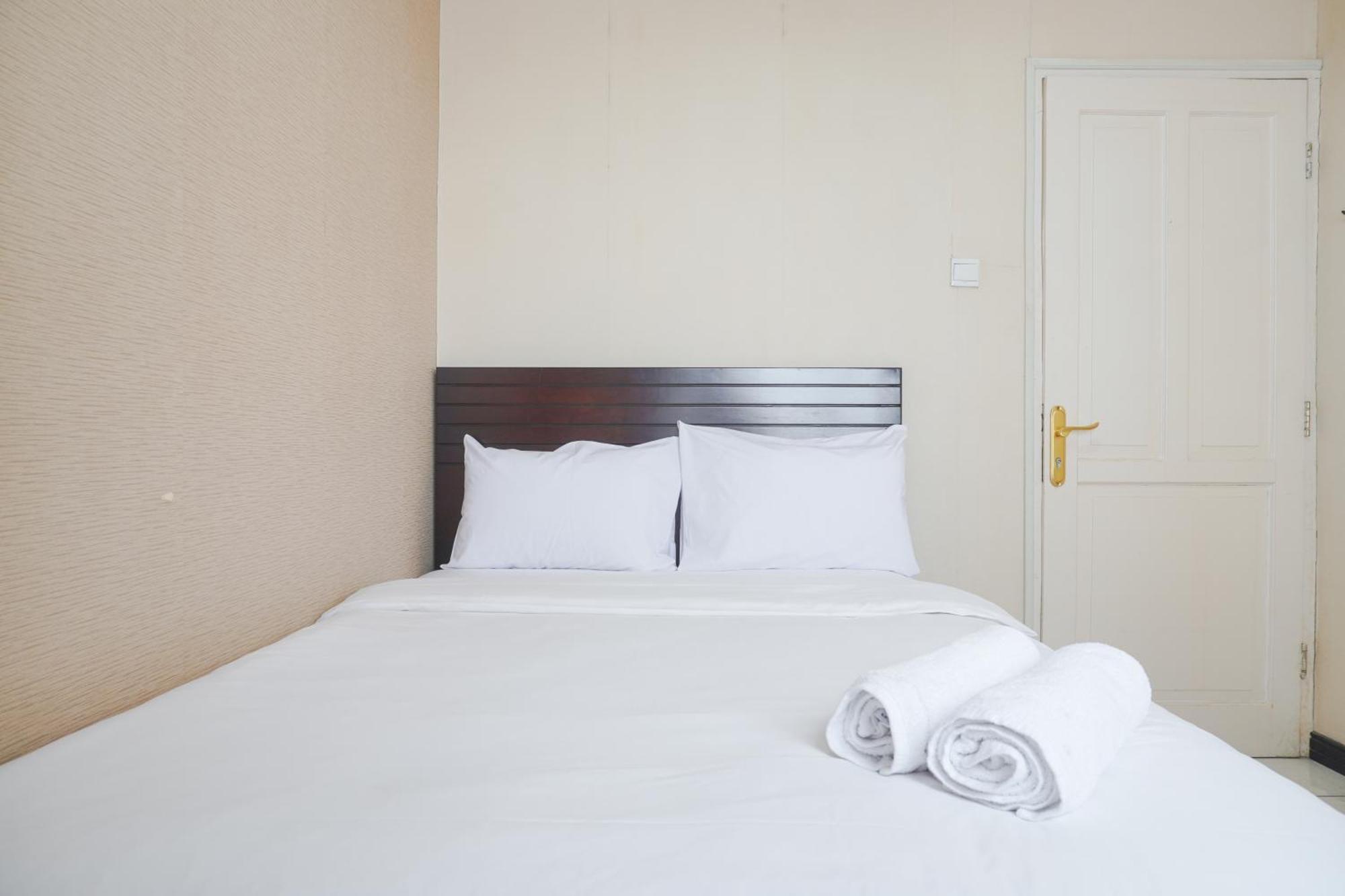 Apartment Cozy And Simply Look 2br At 12nd Floor Puri Garden By Travelio *