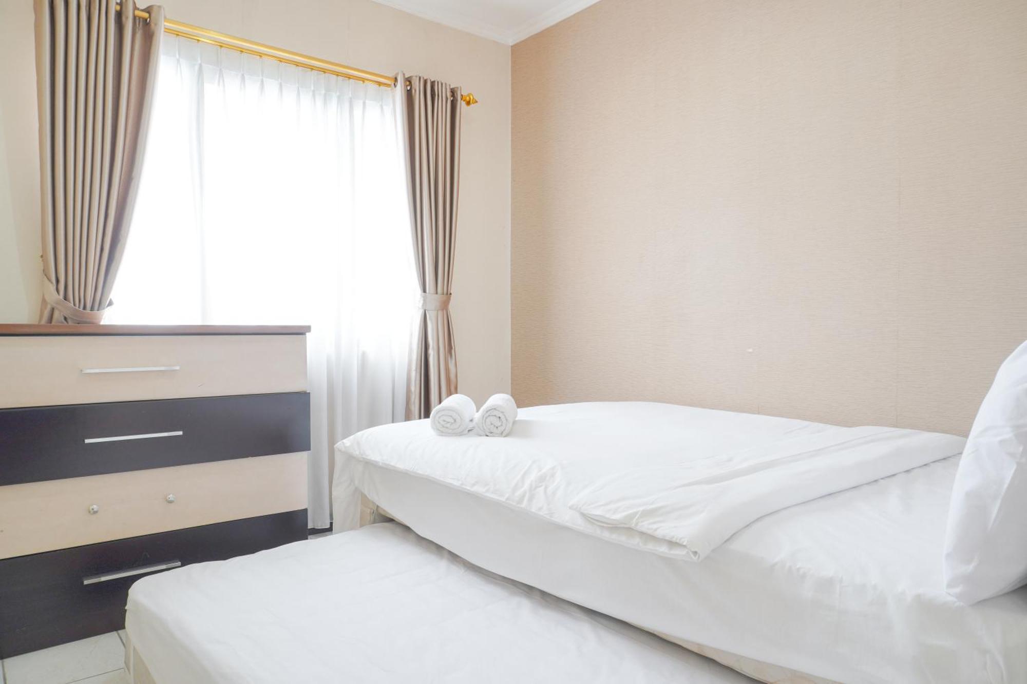 Cozy And Simply Look 2br At 12nd Floor Puri Garden By Travelio