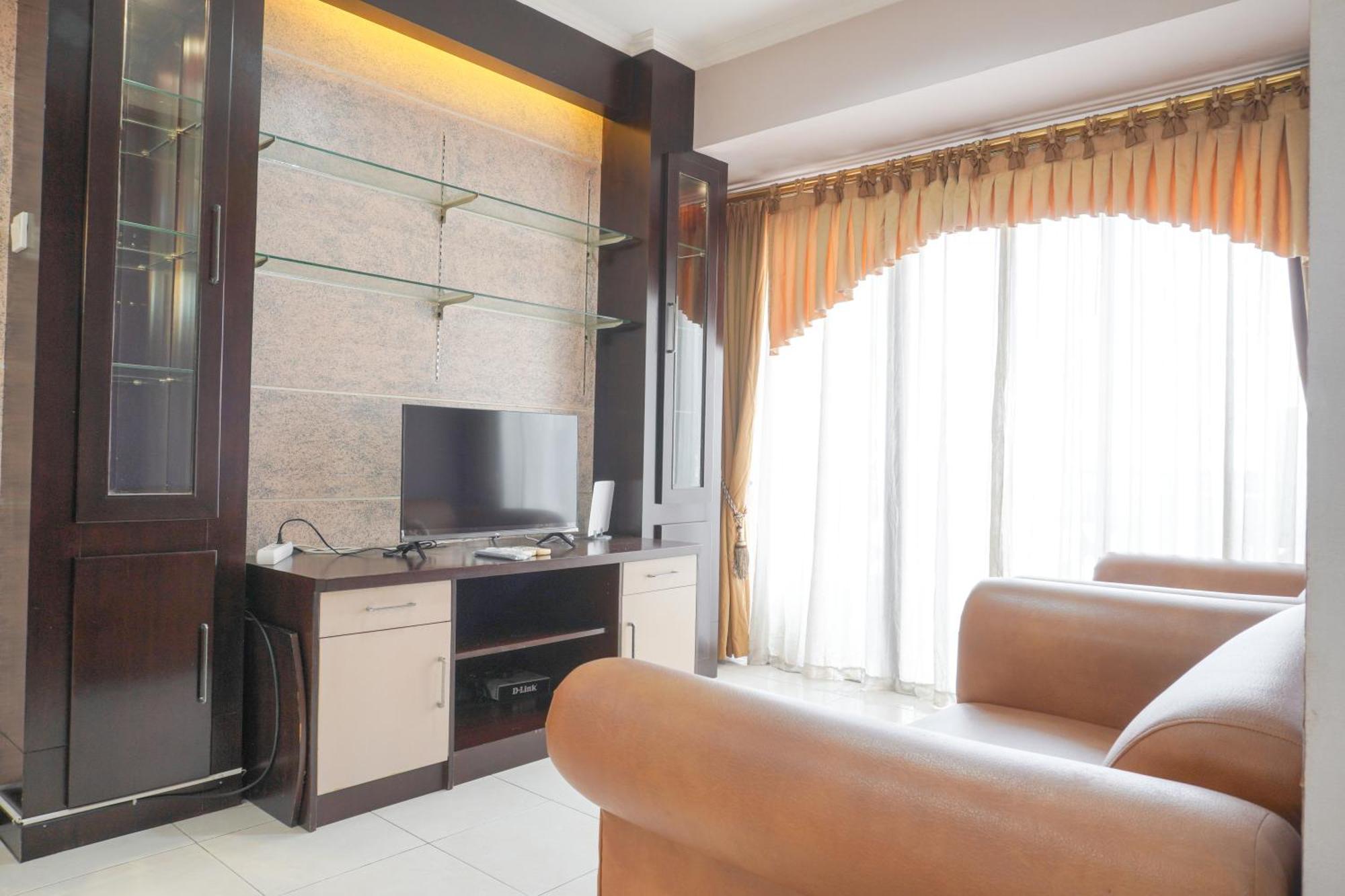 Cozy And Simply Look 2br At 12nd Floor Puri Garden By Travelio Apartment