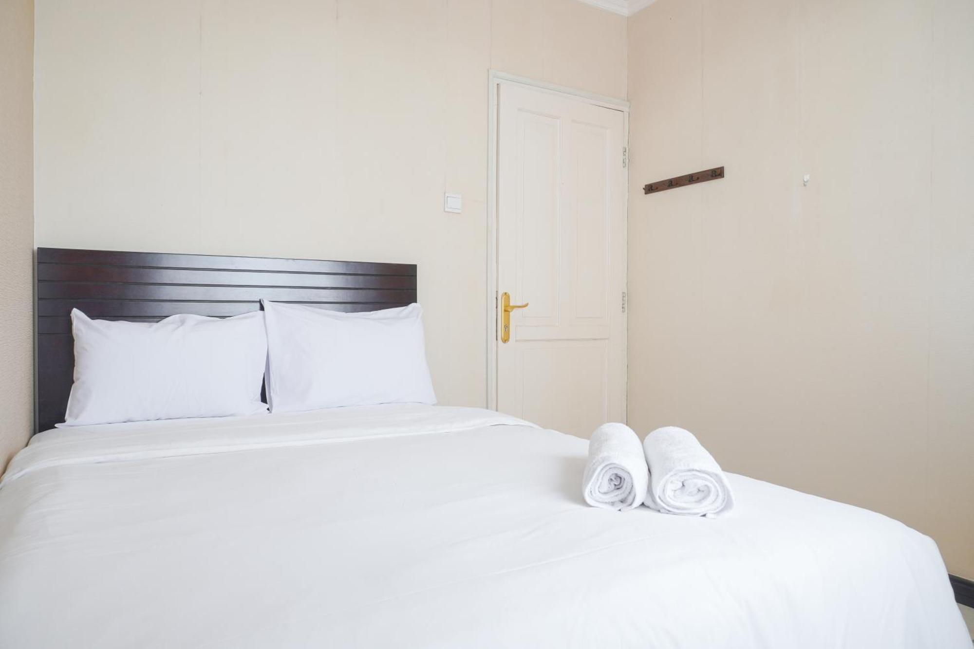 Apartment Cozy And Simply Look 2br At 12nd Floor Puri Garden By Travelio *