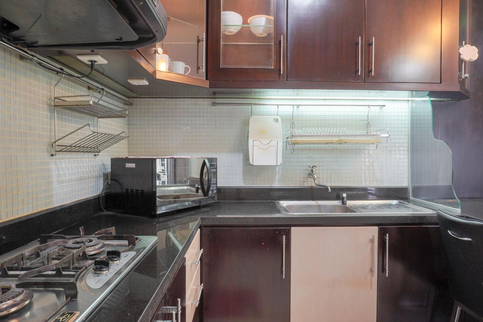 Cozy And Simply Look 2br At 12nd Floor Puri Garden By Travelio *