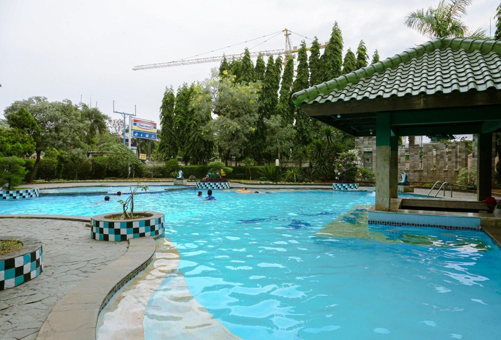 Cozy And Simply Look 2br At 12nd Floor Puri Garden By Travelio Apartment