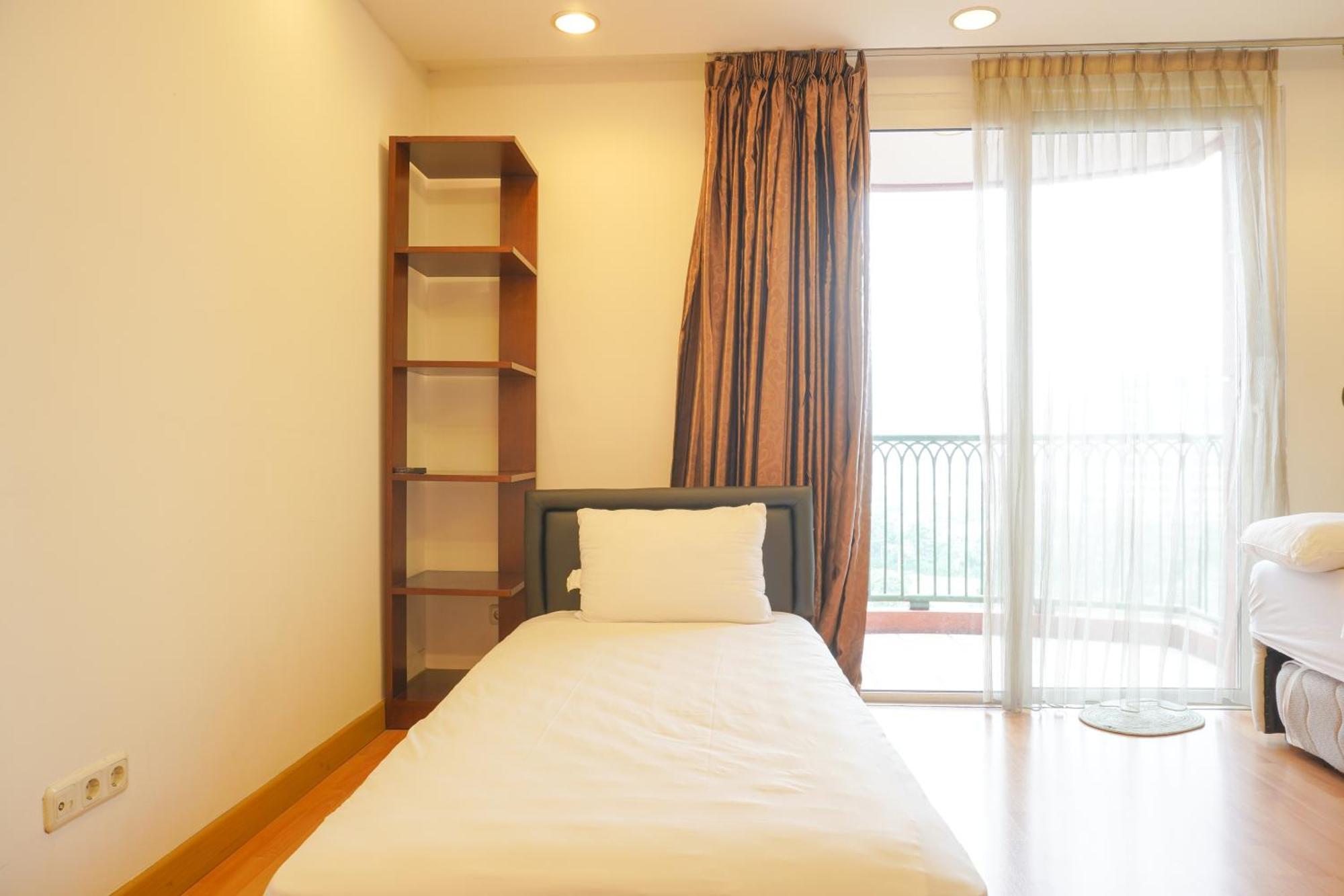 Spacious And Homey 2br At Nuasa Hijau Indah By Travelio