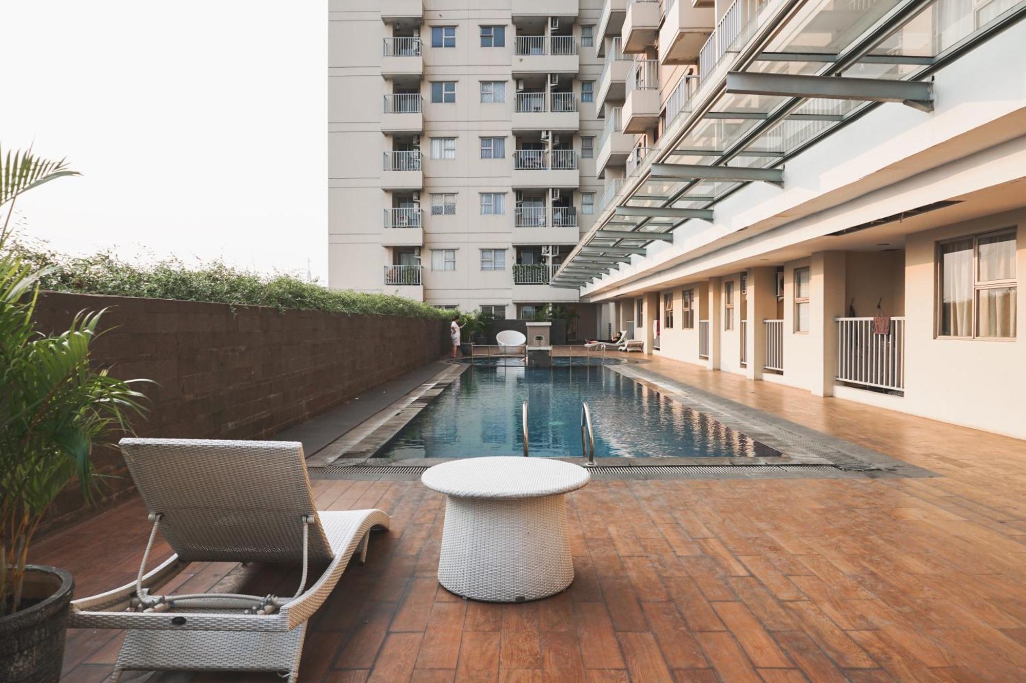 Apartment Homey And Warm 1br Belmont Puri By Travelio