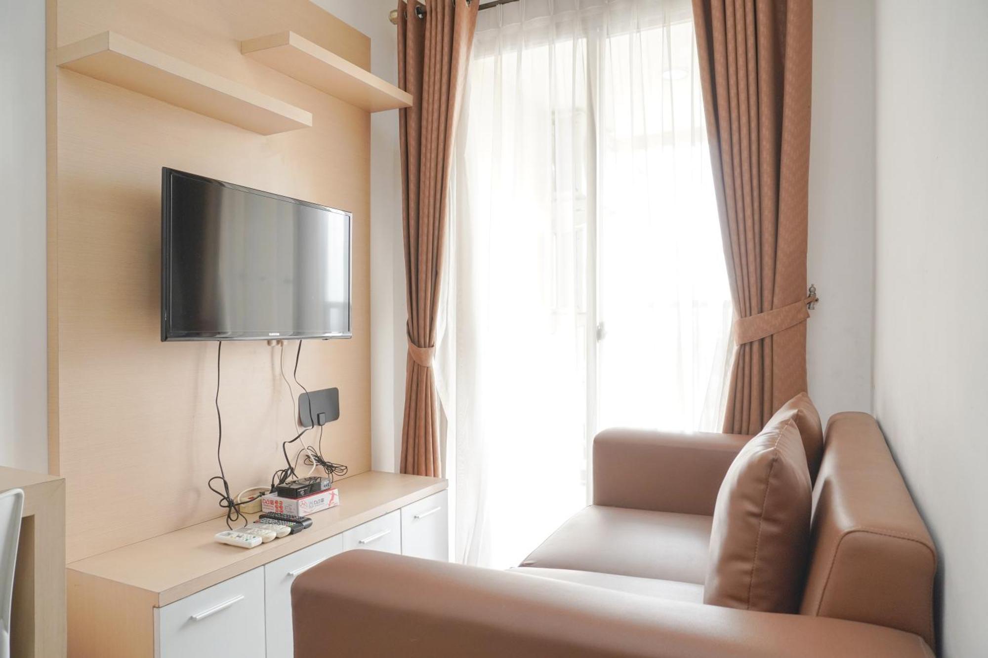 Apartment Homey And Warm 1br Belmont Puri By Travelio Jakarta