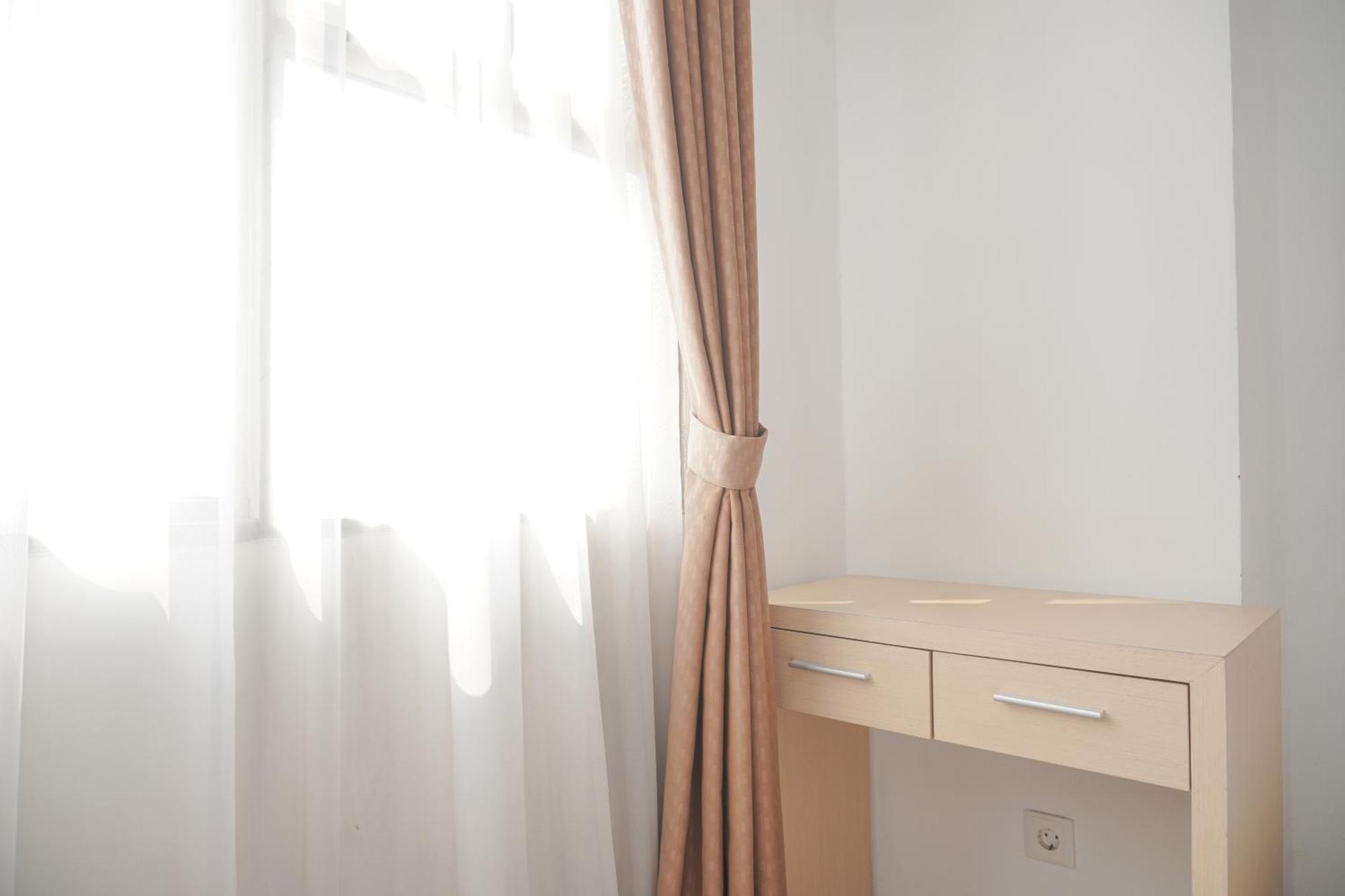 Homey And Warm 1br Belmont Puri By Travelio Jakarta