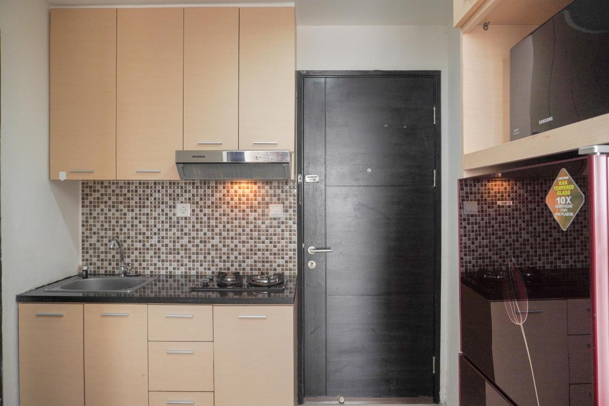 Homey And Warm 1br Belmont Puri By Travelio Apartment *