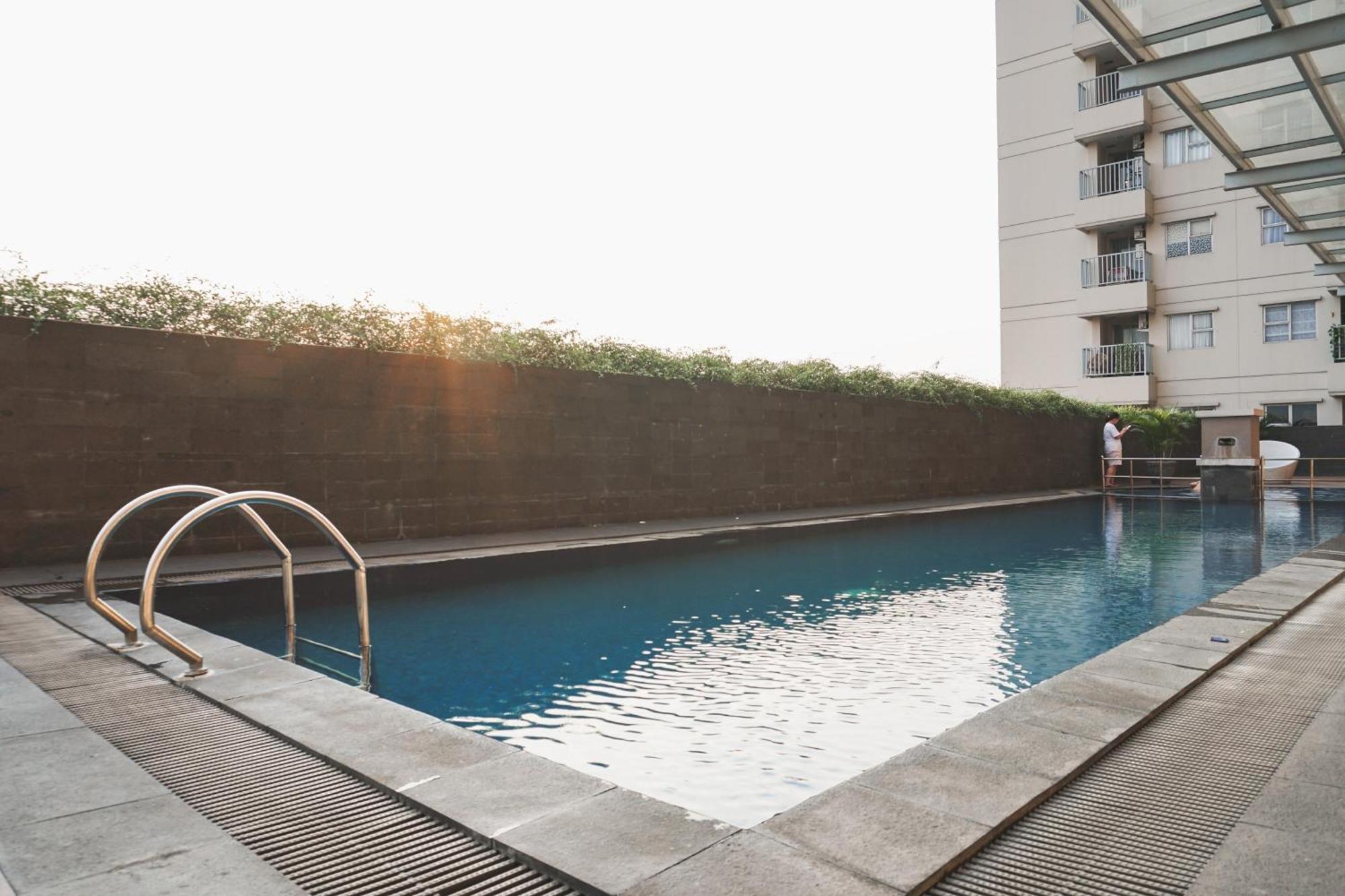 Apartment Homey And Warm 1br Belmont Puri By Travelio Jakarta