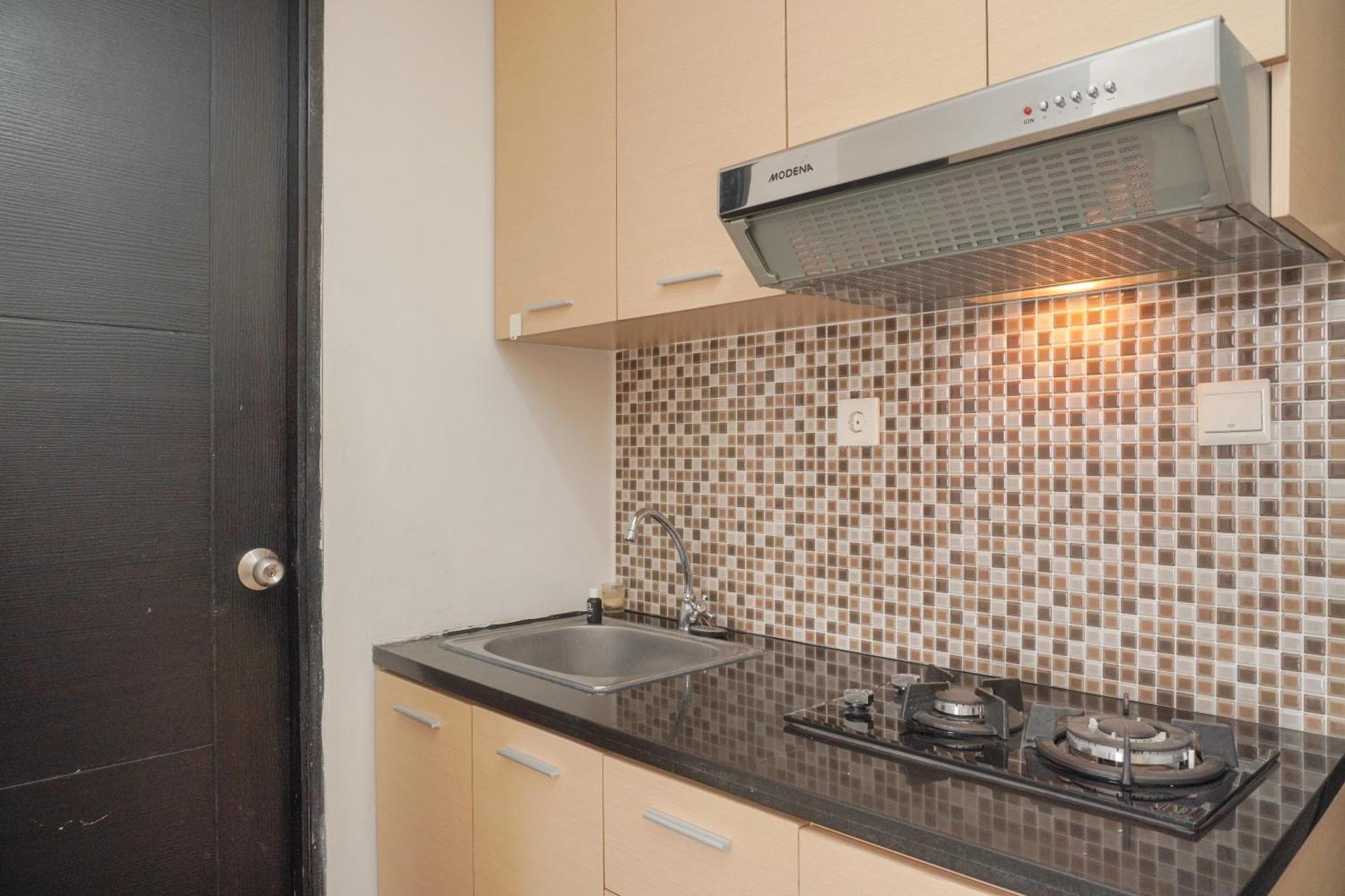 Homey And Warm 1br Belmont Puri By Travelio Apartment
