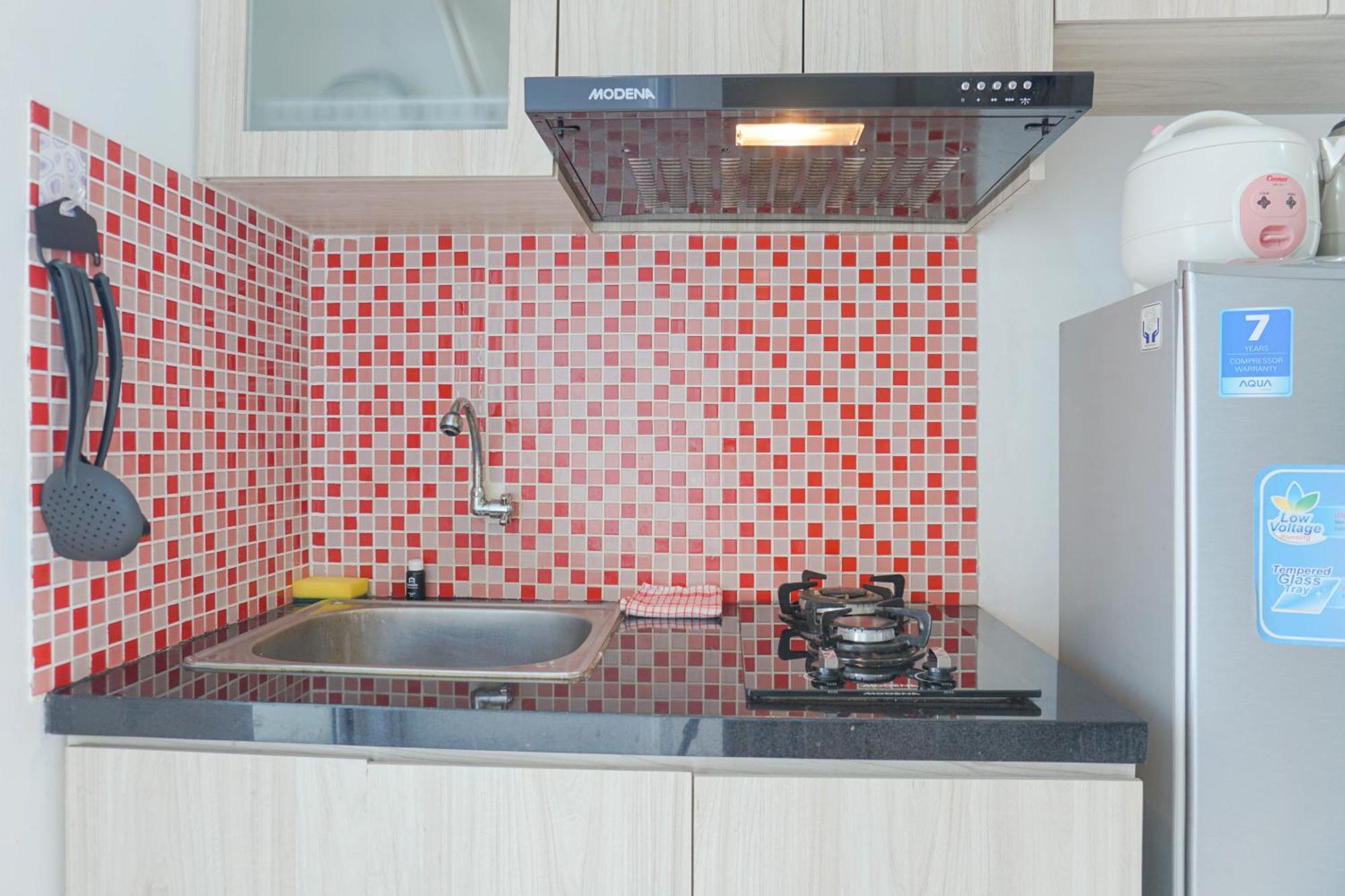 Apartment Cozy And Homey At Bassura By Travelio *